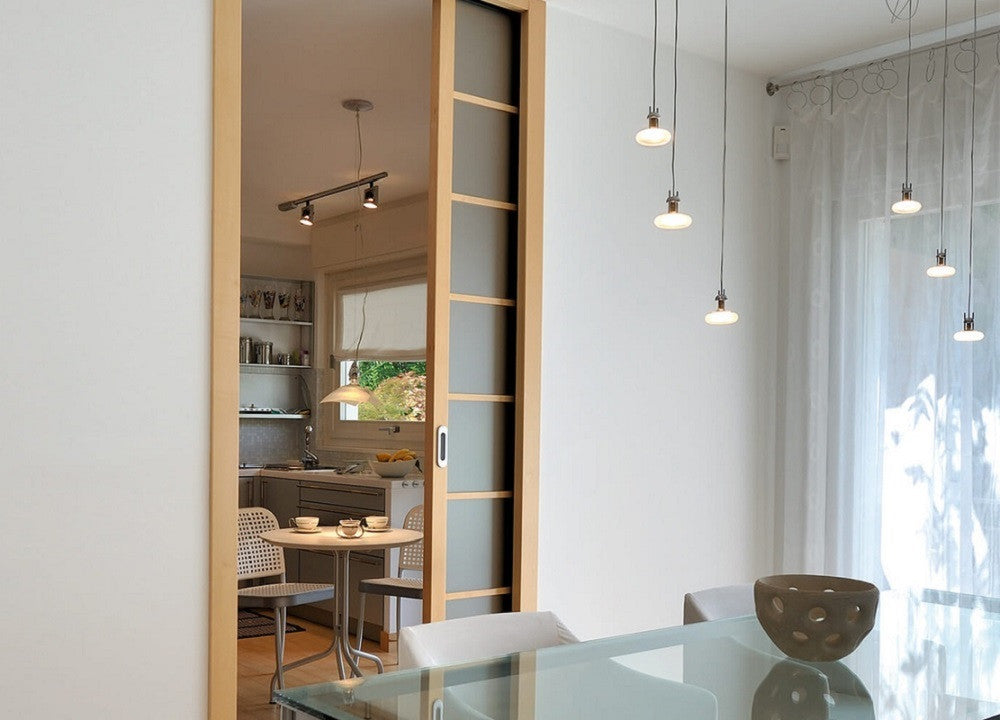 An ECLISSE pocket door system is a great way to maximise usable space.  Here space is maxmised in a kitchen by using an ECLISSE pocket door system.